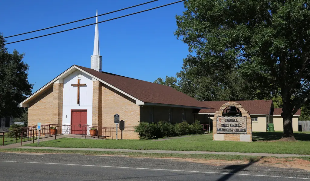 Iredell First United Methodist Church under a brown shingle roof, roofed by Excell Roofing